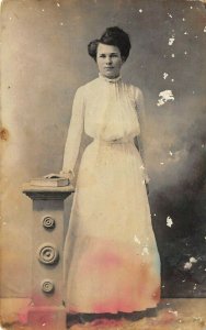 Taiton Texas c1910 RPPC Real Photo Postcard Woman With Book On Pedestal