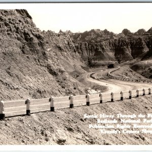 c1930s SD South Daktoa Badlands Park RPPC Scenic Highway Car Road Wood Wall A282