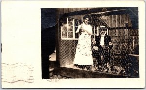 Postcard RPPC c1911 Hamilton Ontario Photo of Man & Lady in Chicken Coupe SRC