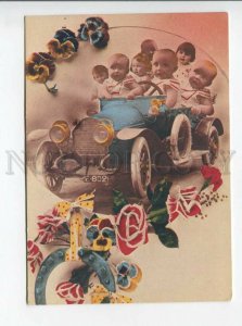 3179480 Children on car pansy MULTIPLE BABIES postcard