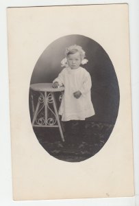 P2755 old azoa RPPC  cute very young child wearing bonnet