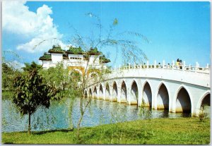 VINTAGE CONTINENTAL SIZED POSTCARD YU HWA CHINESE GARDEN SINGAPORE LOADED STAMPS