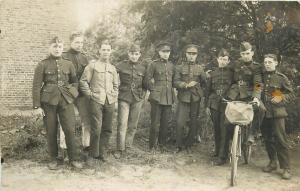 Vintage real photo postcard military men soldiers uniforms bicycle