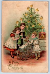 Christmas Postcard Children With Toys Doll On Crib Candle Lights Embossed