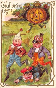 Hallowe'en Jack-O-Lantern Chasing 3 Children, Embossed, Vintage Postcard U10775