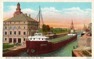 VINTAGE POSTCARD MODERN FREIGHTER LEAVING THE POE LOCK SAULT STE. MARIE MICHIGAN