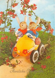 US89 Germany Herzliche Osterreich humanized rabbits in an egg kart  Easter