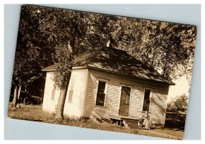 Vintage 1910's RPPC Postcard - Small Farmhouse Woman on Porch Britt Iowa