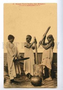 192506 MADAGASCAR woman pounding rice Vintage postcard