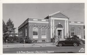 CALDWELL ID 1950s NEW ELLIS RPPC POSTCARD U.S. POST OFFICE CARS PARKING METERS