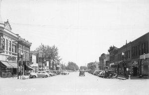 J77/ Grundy Center Iowa RPPC Postcard c1940-50s Main Street Stores 181