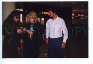 498389 Russia 1997 singer Bonnie Tyler with matryoshka concert in Moscow photo