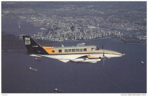 Small Passenger Airplane in Flight, Waglisla Air, Wagair Beech 99 C-FWAD, Van...