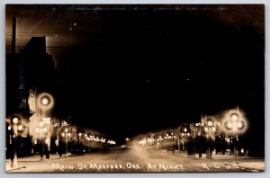 Medford Oregon~Main St~Drug Store @ Night~Xmas Gifts~Bas Relief Sculpture~RPPC