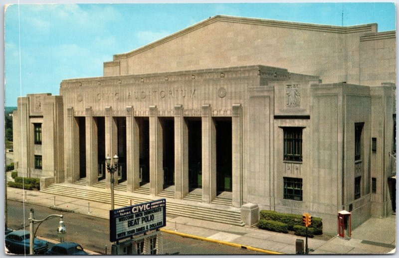 VINTAGE POSTCARD THE CIVIC AUDITORIUM AT GRAND RAPIDS WITH 1960s AUTOS 