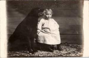 RPPC Adorable Child Primitive Dress with Large Dog Cushing Oklahoma Postcard B29