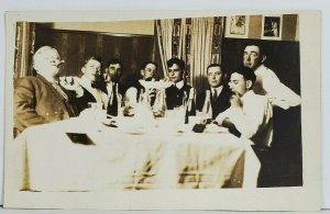 Group of Men Celebrating Cigars Champagne c1910 Real Photo Postcard O4