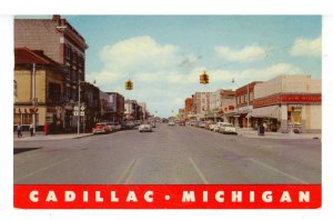 MI - Cadillac. Downtown Street Scene ca 1957