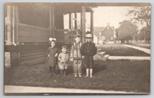 RPPC Cute Boy Wearing  Indian Costume Children On Lawn Real Photo Postcard Q24