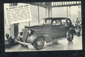 1937 CHEVROLET SEDAN VINTAGE CAR DEALER ADVERTISING POSTCARD MENARD TEXAS