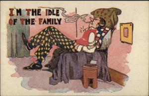 Man in Chair Smoking Cigarette THE IDLE OF THE FAMILY Comic Postcard rpx