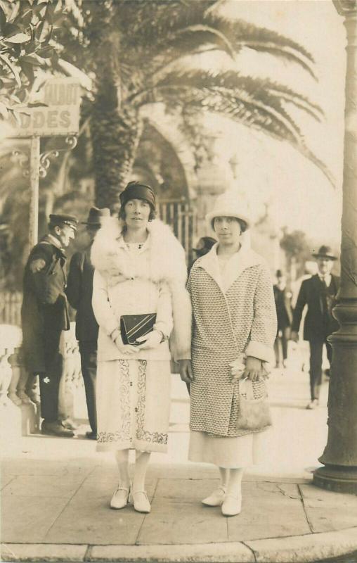 Women with fancy hats early photo postcards x 5