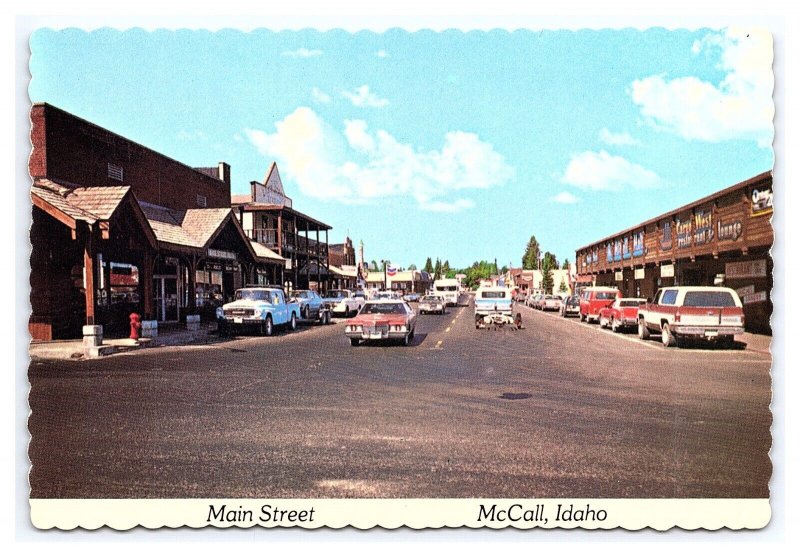 Main Street McCall Idaho Continental View Postcard Old Cars Storefronts