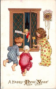 New Year Postcard Children Opening Window for Cherub Baby New Year to Fly in