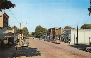 White Cloud Michigan Business District Rexall Drug Store Postcard AA65553 