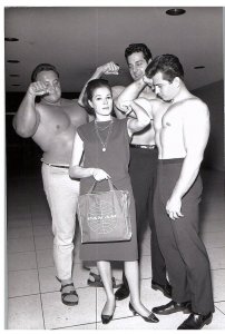 RPPC Postcard REPRINT Luciana Paluzzi Italian Actress Pan Am Bag Muscle Men