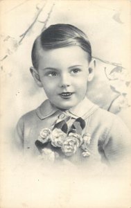 Children portraits & scenes boy rose haircut elegance innocence handsome