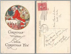 MERRY CHRISTMAS 1917 ANTIQUE POSTCARD - SANTA w/ GIFTS DOLLS TRUMPET