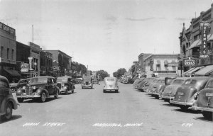 RPPC CARS SIGNS MAIN STREET MARSHALL MINNESOTA REAL PHOTO POSTCARD 1945