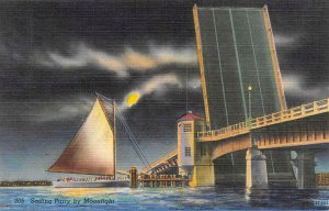 SAILBOAT Passing Through Open DRAW BRIDGE in MOONLIGHT  c1940's Linen Postcard