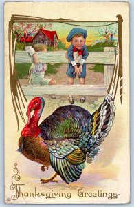 c1910's Thanksgiving Greetings Children On Fence Turkey Embossed Posted Postcard
