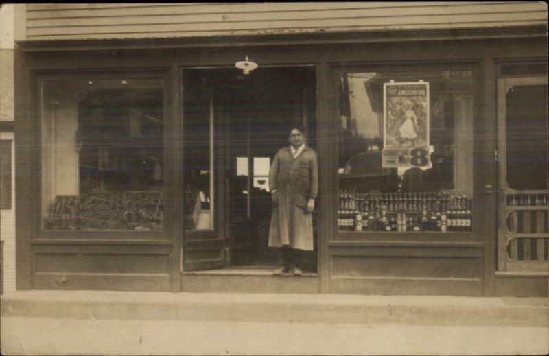 Storefront Store Man in Doorway THEATRE POSTER FOR LAMBERT HALL in WINDOW rppc