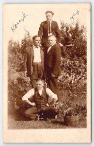 RPPC Handsome Men Posing To Form Totem Pole Postcard Q24
