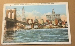 VINTAGE USED 1925 PENNY PC BROOKLYN BRIDGE WOOLWORTH & MUNICIPAL BLDGS. N.Y.