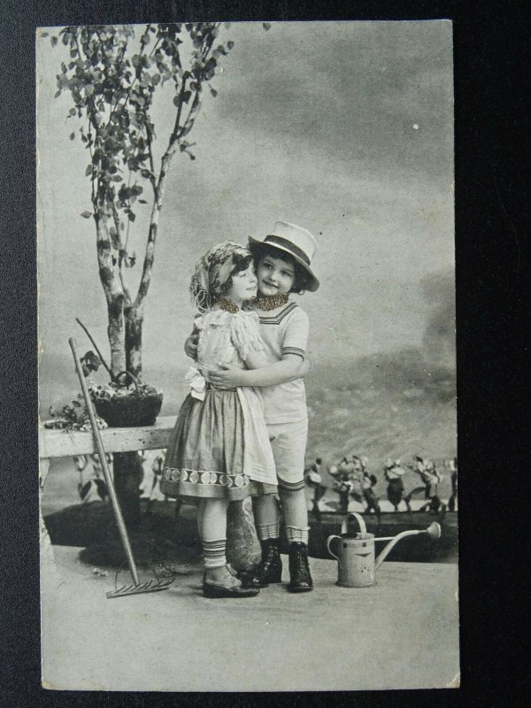 Greeting GARDENING THEME Children with Rake & Watering Can c1914 Postcard