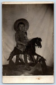 c1910's Little Boy Ride On Rocking Horse Cowboy RPPC Photo Antique Postcard