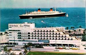 Yankee Clipper Hotel with SS France in ocean nearby vtg cars boats cruise ship 