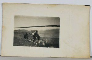 Hanley Sask. Canada Young Men Scene by Water Rifle Gun RPPC c1907 Postcard K15