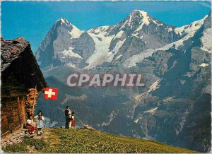 Postcard Modern Alphornbl�ser und Familie mit Eiger Monch und Alphorn Playe...