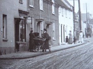 Hertfordshire BUSHEY HEATH High Street shows Agent for PULLARS c1919 RP Postcard