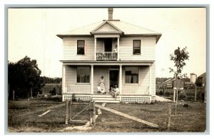 Vintage 1910's RPPC Postcard Family Sits on Porch of Country Craftsman Home