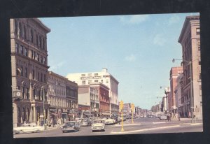 PITTSFIELD MASSACHUSETTS DOWNTOWN STREET SCENE OLD CARS STORES VINTAGE POSTCARD