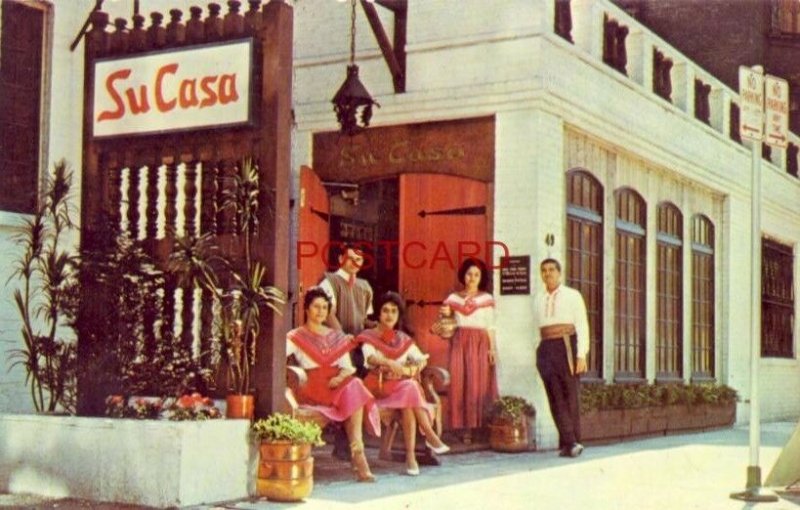 SU CASA - CHICAGO'S MOST EXCITING NEW RESTAURANT staff poses at entrance