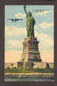 NEW YORK CITY NY THE STATUE OF LIBERTY AIRPLANE VINTAGE POSTCARD 1932