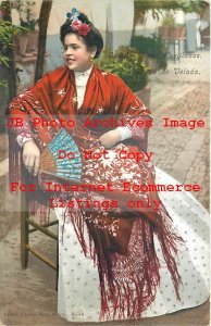 Native Ethnic Culture Costume, Sevilla Spain, Woman Sitting in Chair Holding Fan