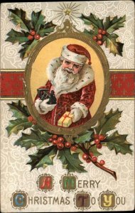 Christmas Santa Claus Toy Train Holly Gilt Embossed c1900s-10s Postcard